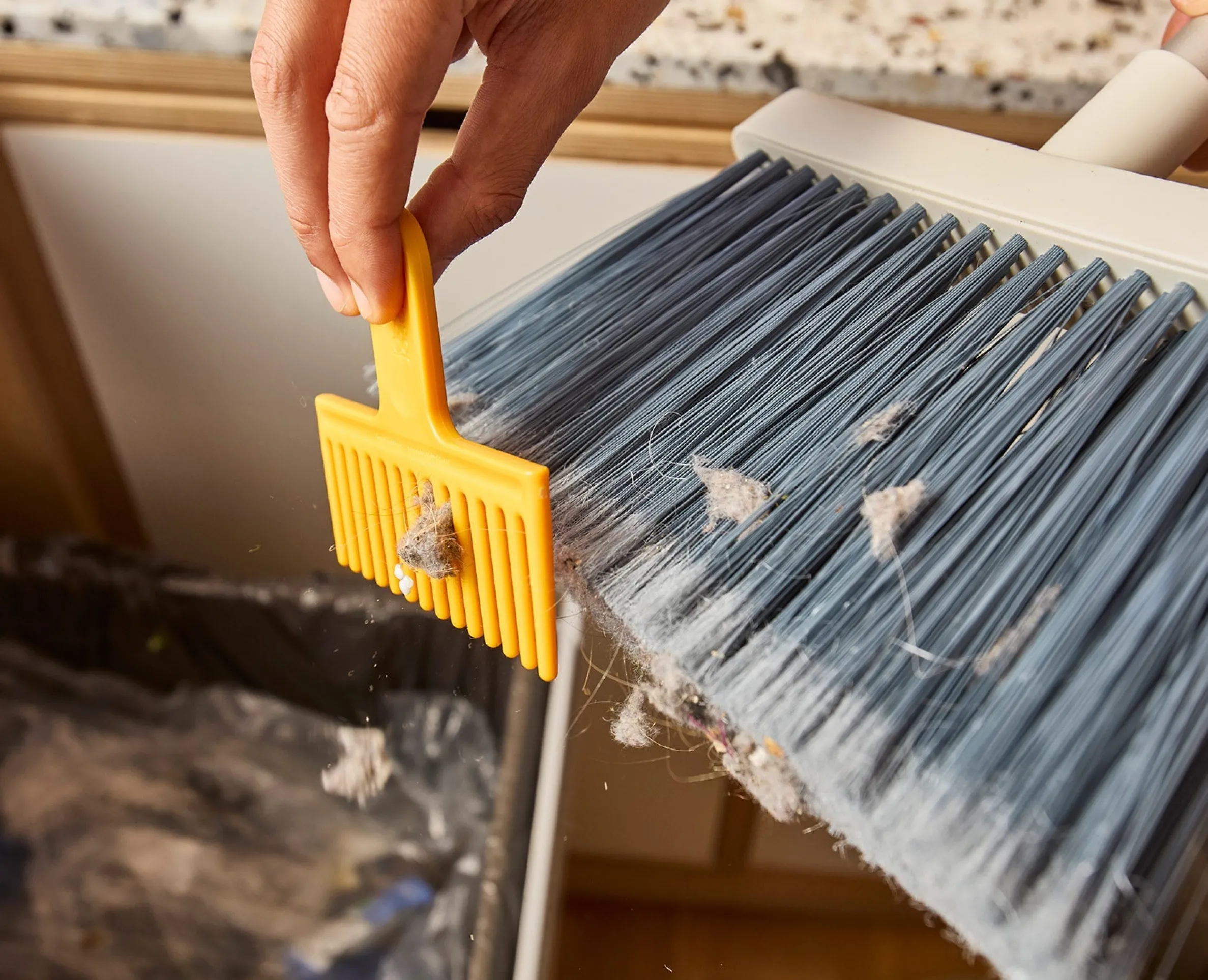 CleanTech™ Wall-Mounted Broom